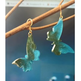Σκουλαρίκια πεταλούδες από υγρό γυαλί 5x3cm